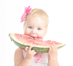 Little-girl-eating-watermelon-isolated-on-white-background