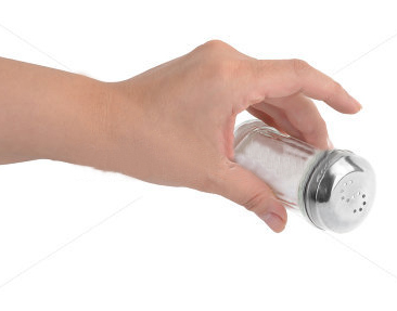 female-hand-pouring-salt-from-salt-shaker